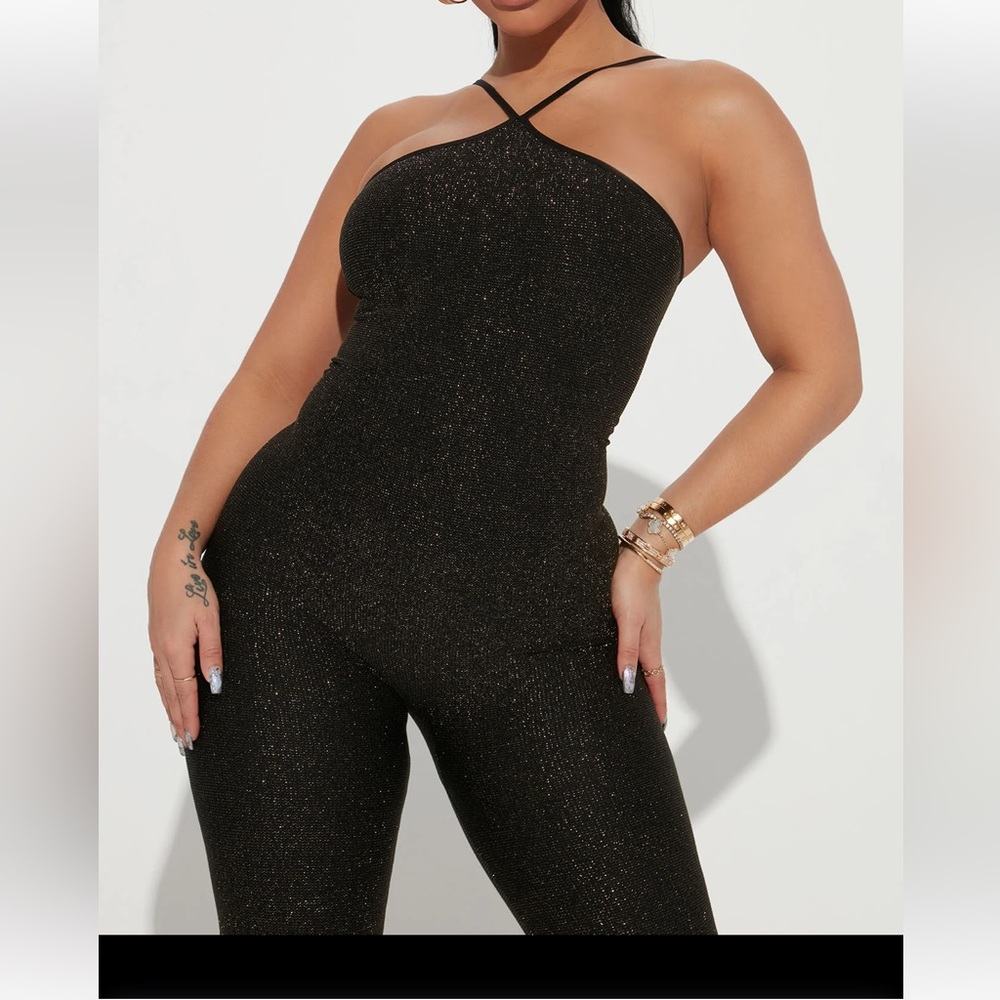 Stretchy black sparkly jumpsuit size L
